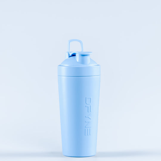 Blue shaker bottle with flip-top lid; vertical DELINE logo on side.