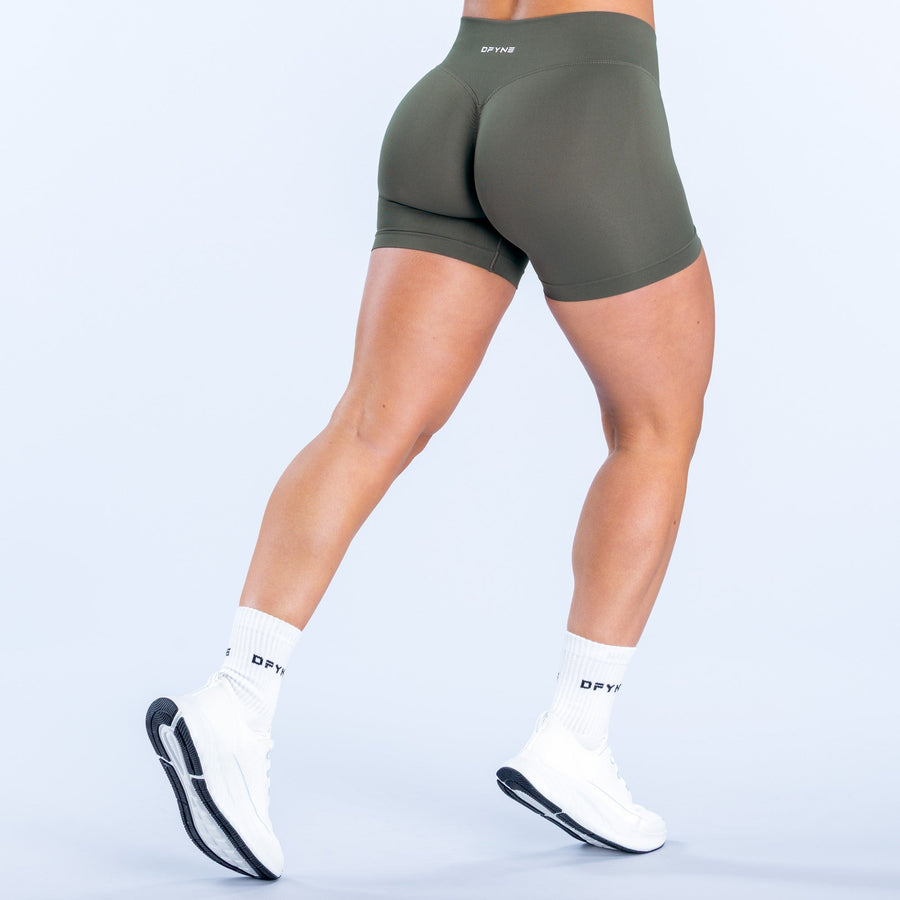 Olive green back view of fitted 4.5-inch shorts with small logo patch.