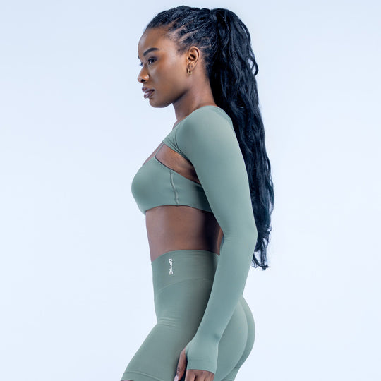 Olive cropped long-sleeve shrug with smooth stretch fabric and side profile
