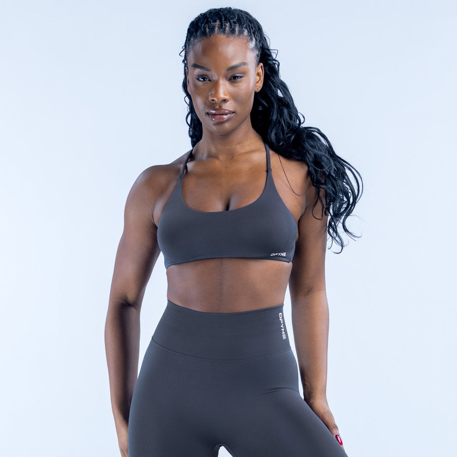 Dark performance sports bra with scoop neckline and slim straps
