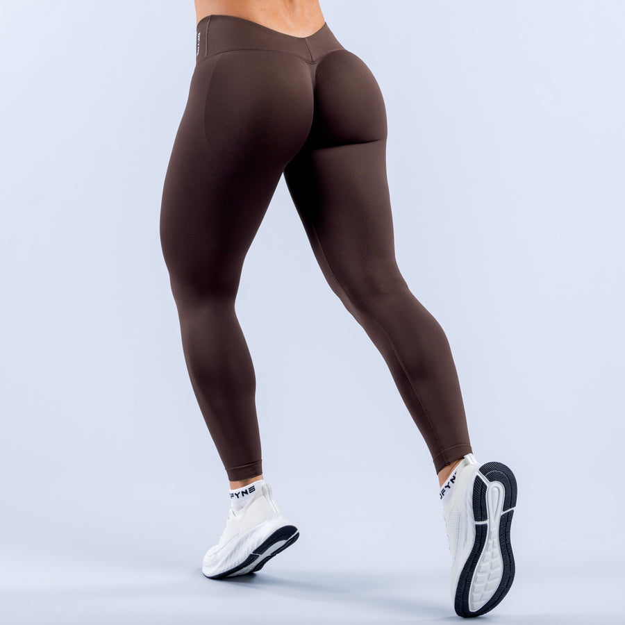 Dark brown ankle-length leggings with smooth stretch fabric and fitted legs