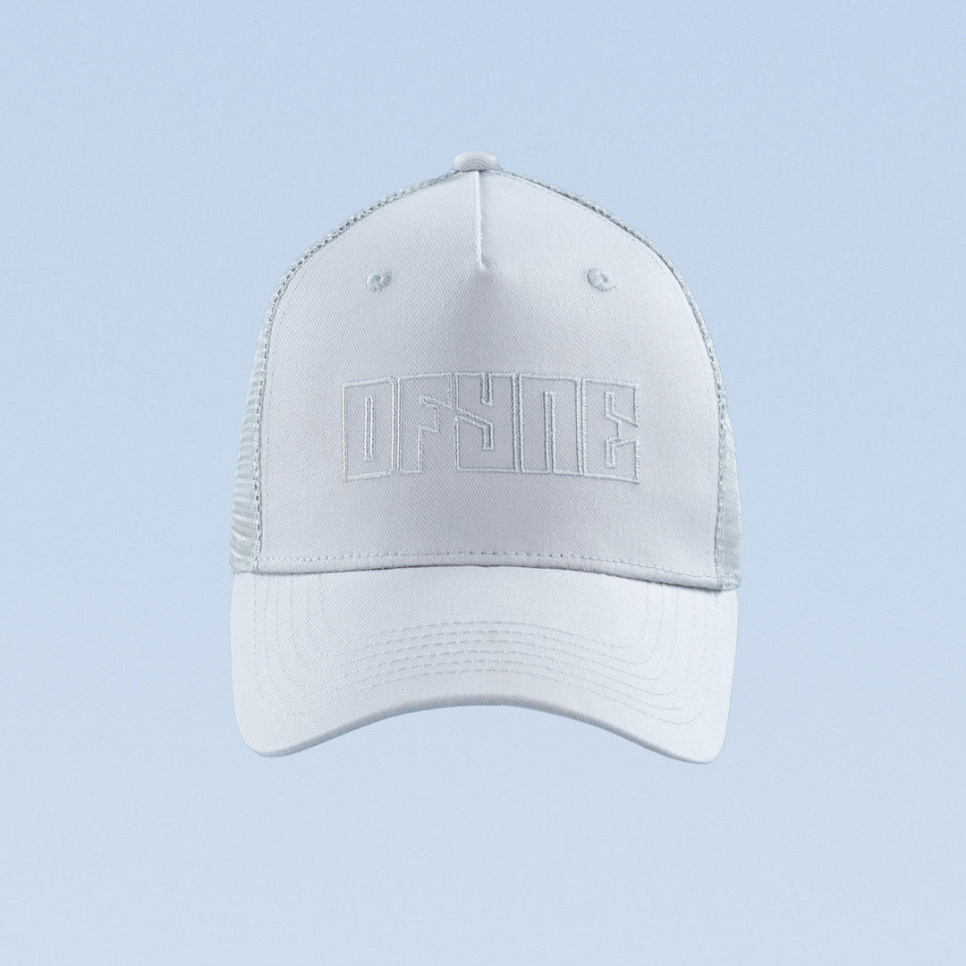White trucker cap with raised front logo embroidery and curved brim