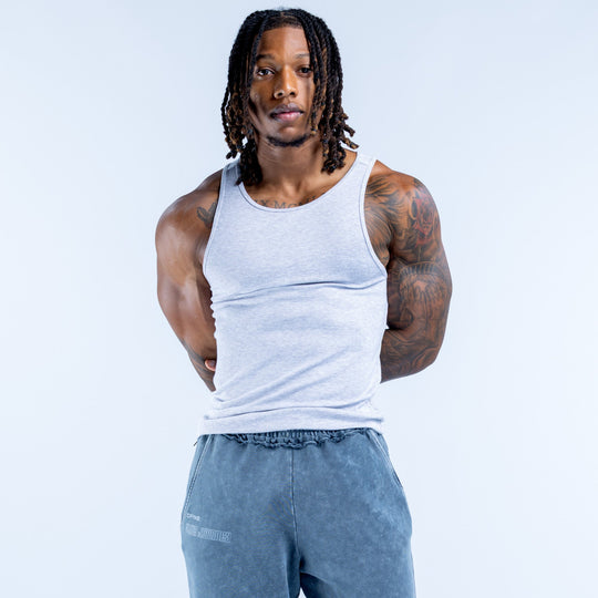 Light blue ribbed sleeveless vest with crew neck, worn on model
