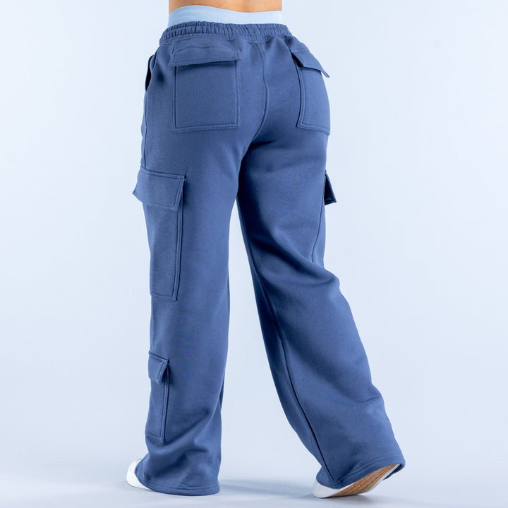 Navy-blue cargo jogger pants, back view with flap cargo pockets and elastic cuffs