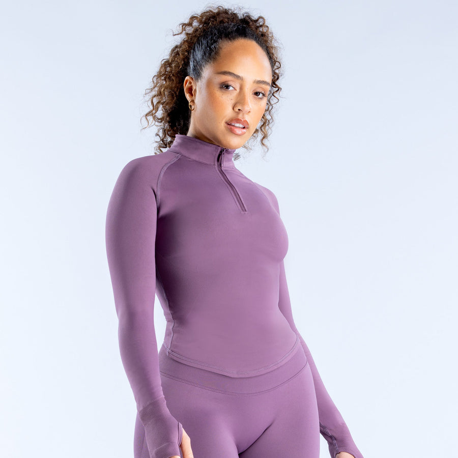 Purple women’s half-zip performance top, long sleeves, mock neck zipper