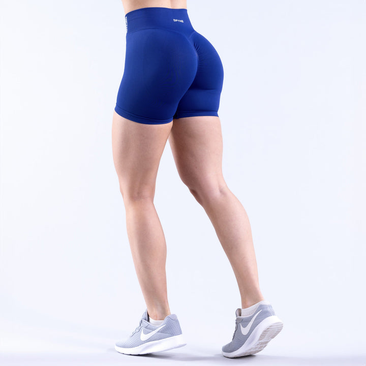 4.5-in blue performance shorts, rear side view, seamless stretch fit