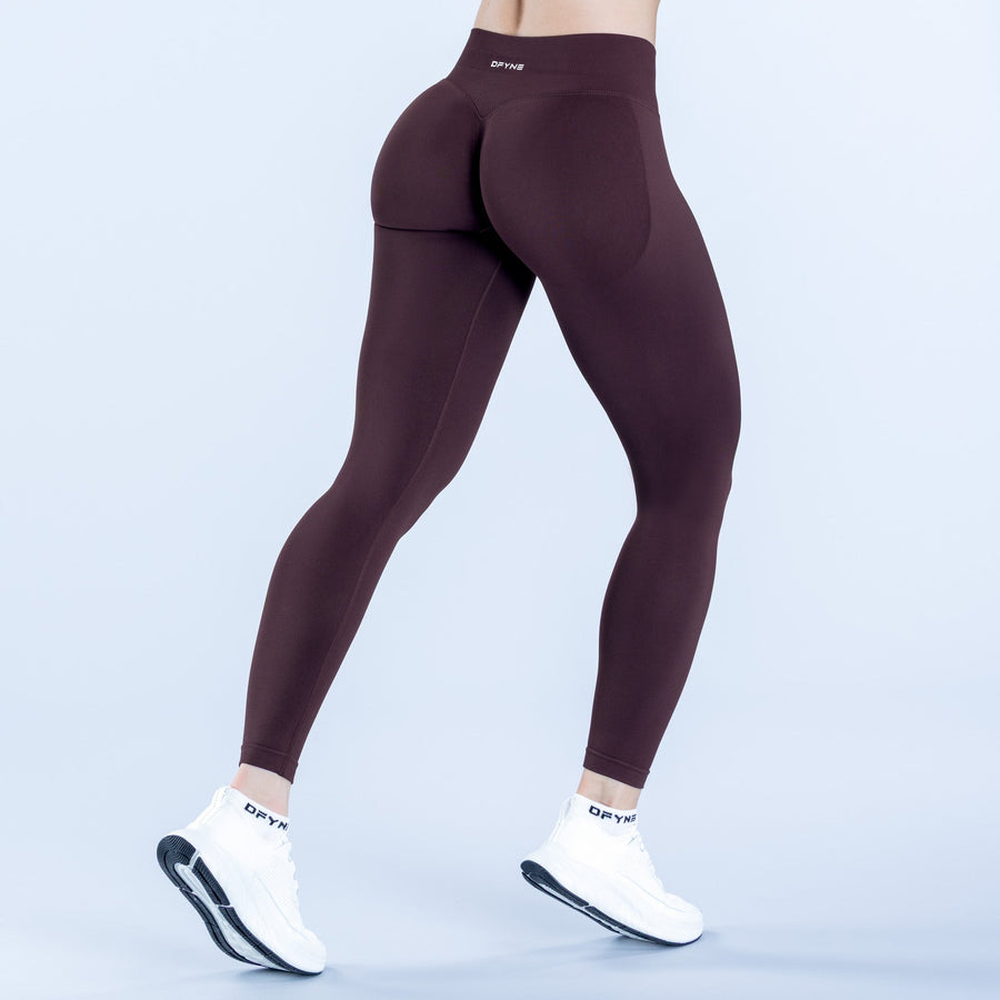 Dark plum impact leggings with rear seam and high-rise waistband