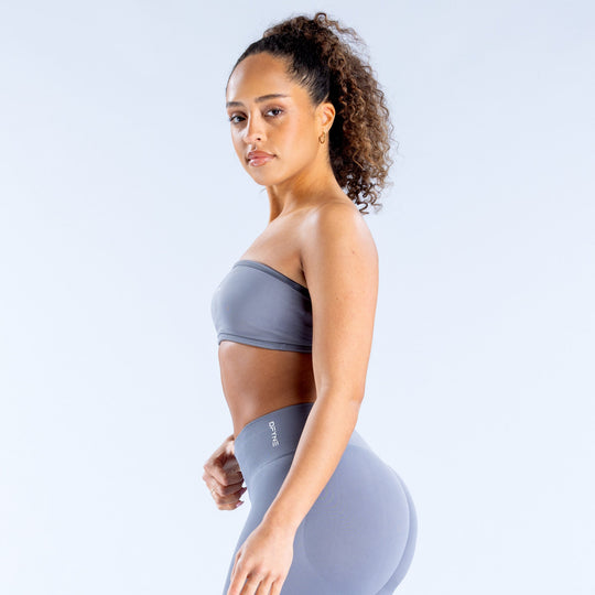 Backless bandeau sports bra in slate blue, side view with smooth underband