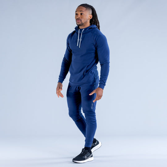 Royal blue midweight hoodie with drawstring hood and kangaroo pocket, full body