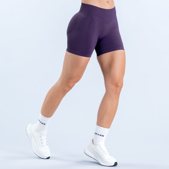 Purple 4.5-inch fitted shorts shown from the front with a smooth waistband.