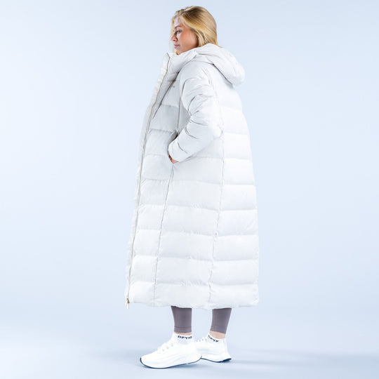 White long down puffer jacket with attached hood, side profile view