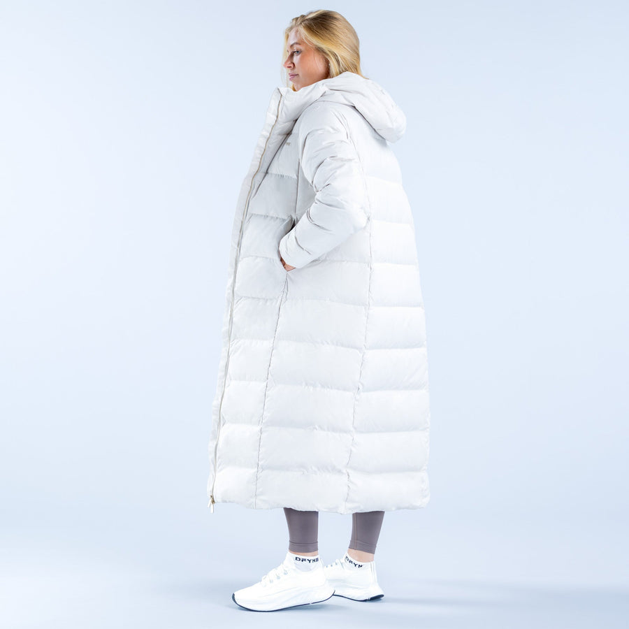 White long down puffer jacket with attached hood, side profile view