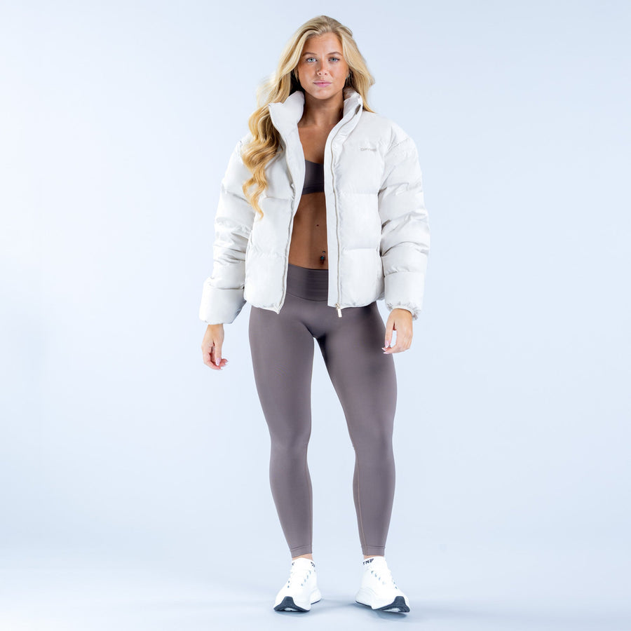 Short white down jacket with full zip and stand collar, side pockets