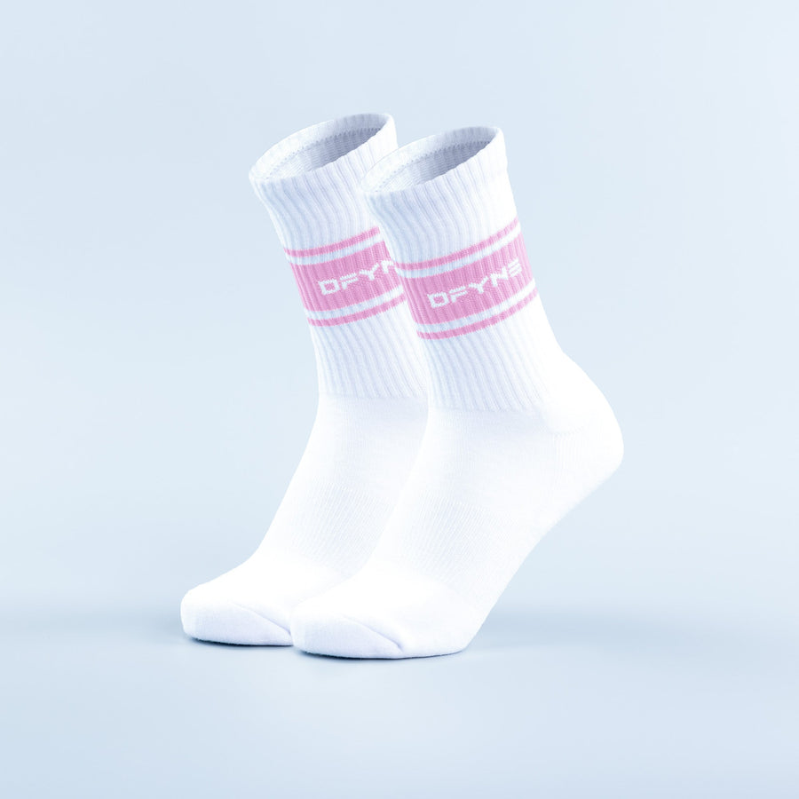White crew sports socks with pink stripe bands and ribbed cuff