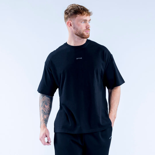 Men's black crew-neck graphic T-shirt, small chest logo detail