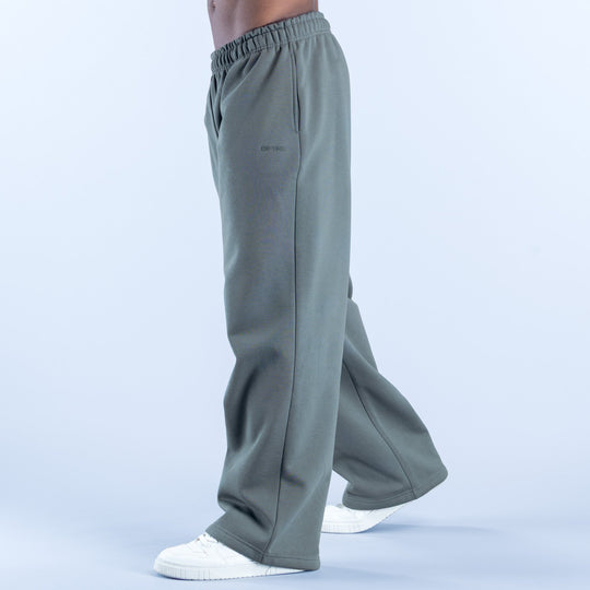 Sage green relaxed joggers with elastic waistband and side seam pockets