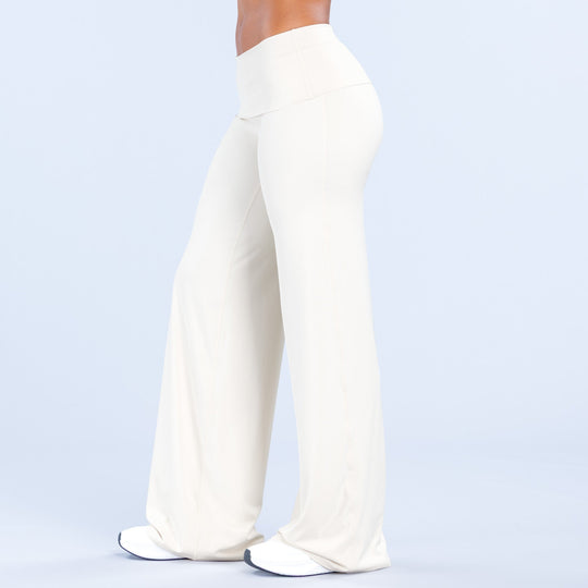 White fold-over wide-leg pants with wide waistband and flowing wide hem