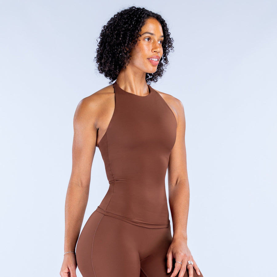 Brown longline halter-style tank top with curved waist seam