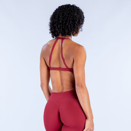 Rugby red sports bra, racerback style with crisscross back straps