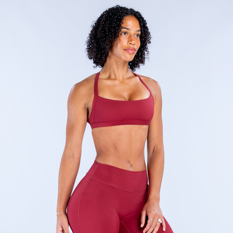 Rugby red sports bra with supportive wide band and scoop neckline