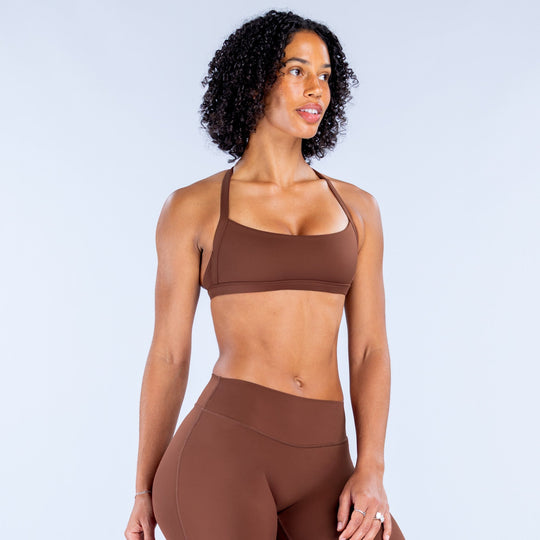 Dark brown sports bra with wide band and scoop front neckline