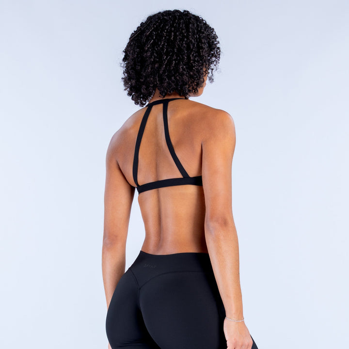 Back view of a black sports bra with crisscross straps