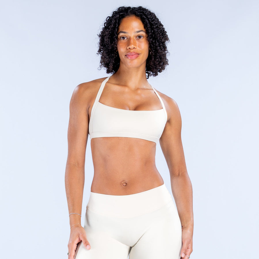 White halter sports bra with wide square neckline