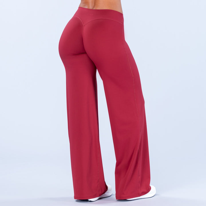 Red wide-leg pants with high waist and smooth drape