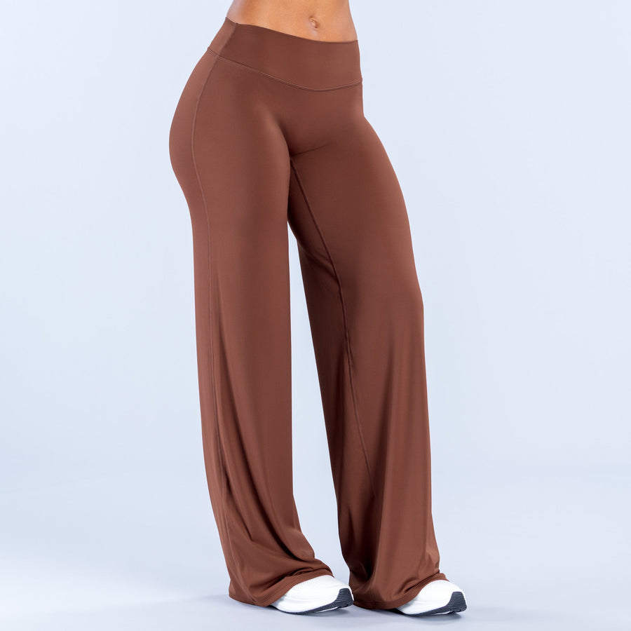 Brown wide-leg pants, front view, high-rise elastic waist and wide flowing legs