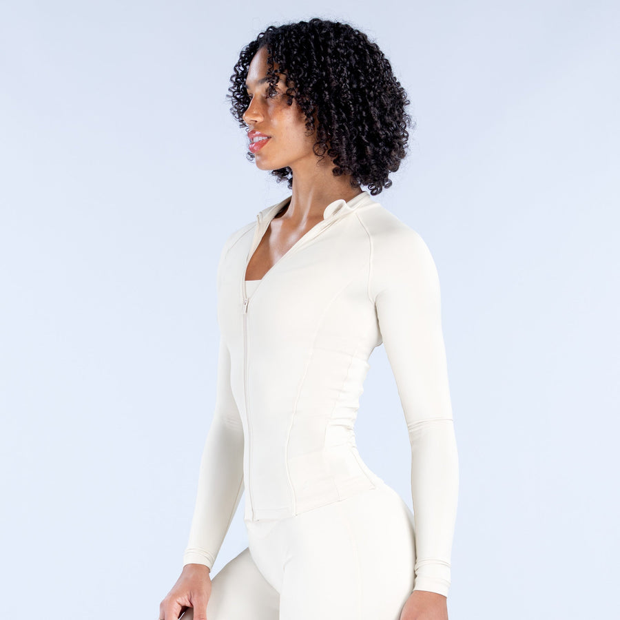 Off-white Sav Zippy zip-up top and leggings, side profile with full front zipper