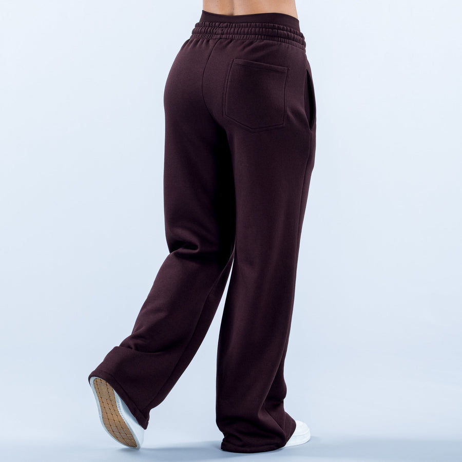 Dark maroon wide-leg jogger pants with elastic waistband, back pocket, roomy straight legs
