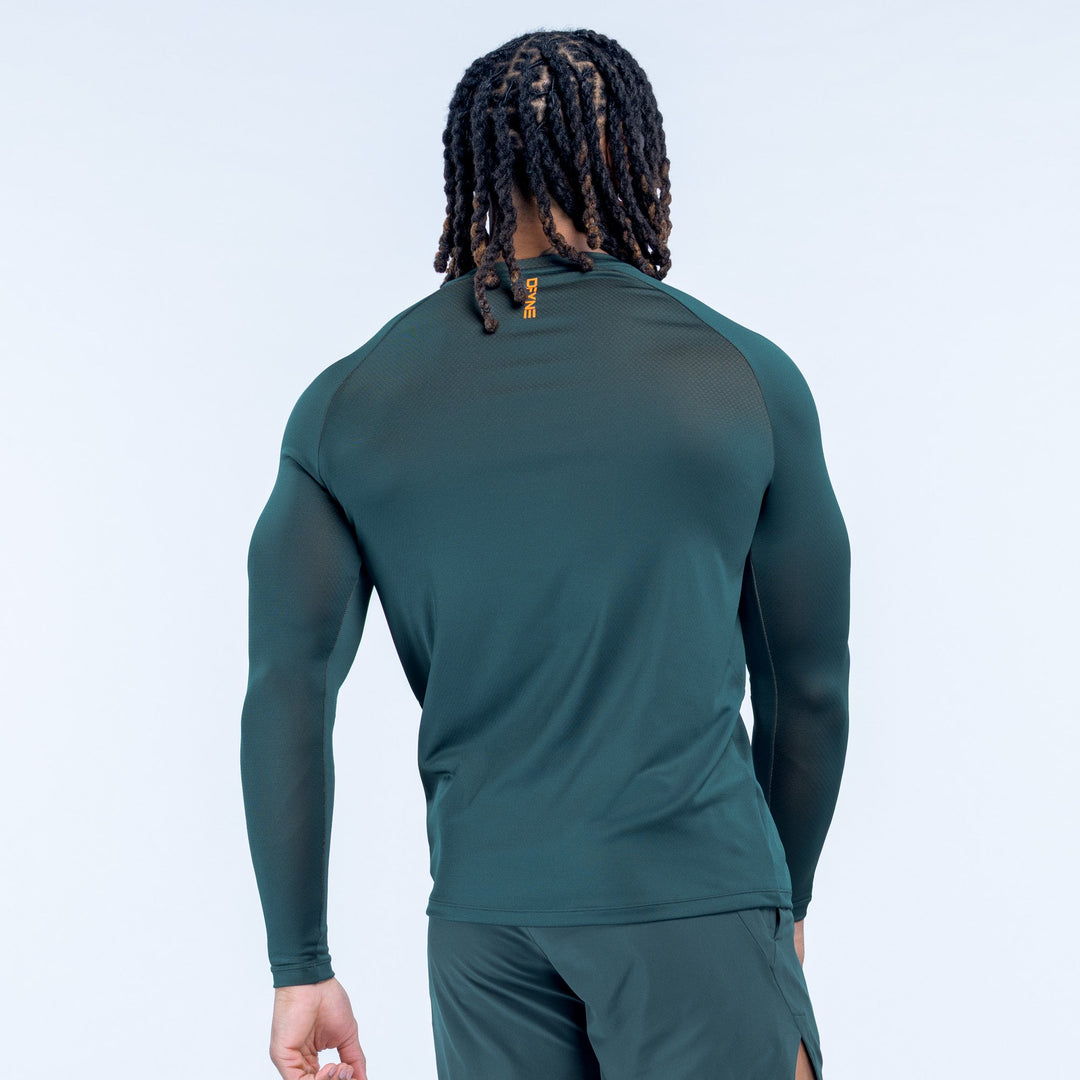 Long-sleeve training t-shirt, dark teal green, back view with small logo at collar
